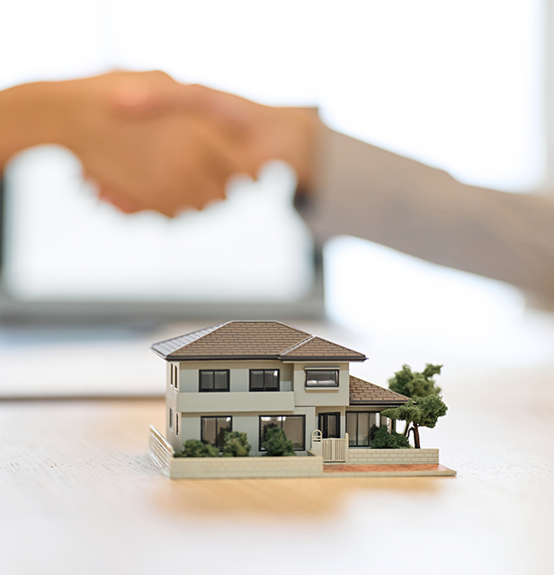 A man and a woman shaking hands